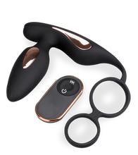 Load image into Gallery viewer, Analplug mit Vibration und Doppel-Cockring Domino