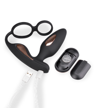 Load image into Gallery viewer, Analplug mit Vibration und Doppel-Cockring Domino